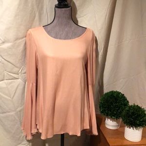 Peach blouse with bell sleeve
